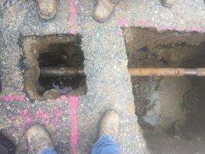 Visual verification of drill bit safely passing over subsurface utility location.